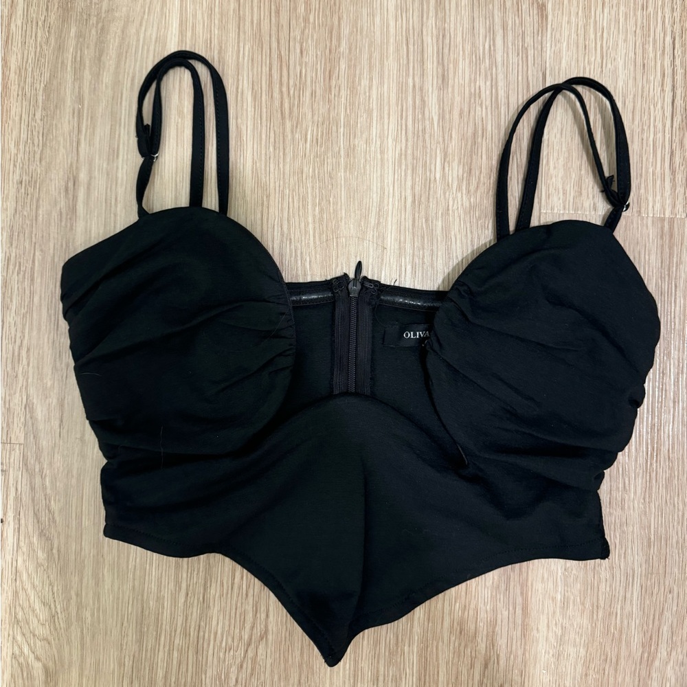 Olivaceous black fancy top with cut outs size small